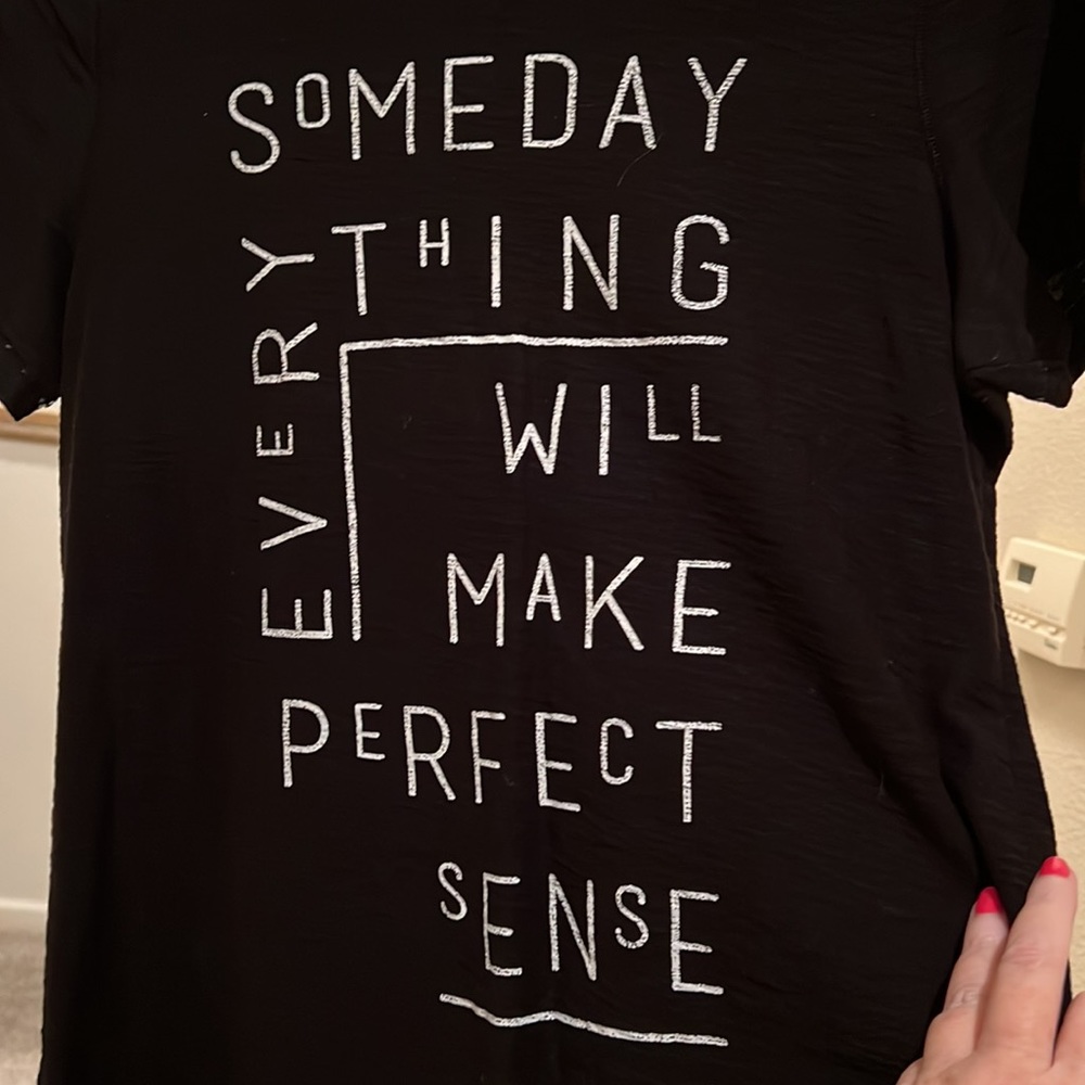 Label of Graded Goods T-shirt. “Someday everything will make perfect sense”.